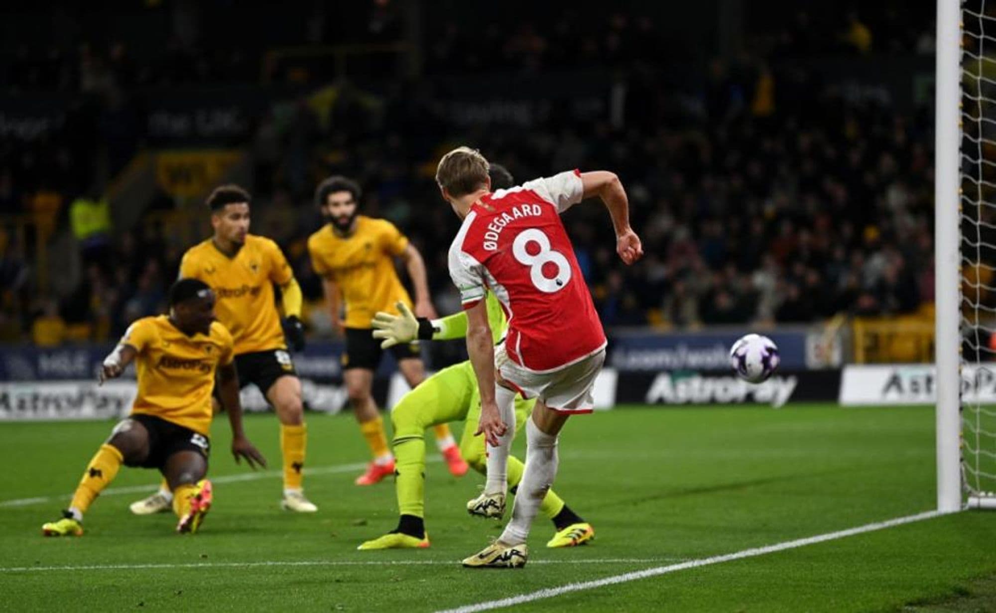 # Title: Arsenal's Gritty Win Over Wolves Sends Them Back to the Top of the Premier League